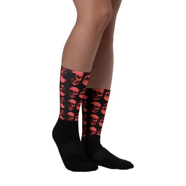 Red Skulls Opposites Socks by Robert Bowen