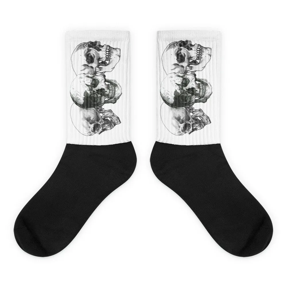 Triple Skulls Black foot socks illustrated by Robert Bowen