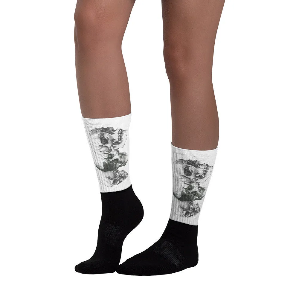 Triple Skulls Black foot socks illustrated by Robert Bowen