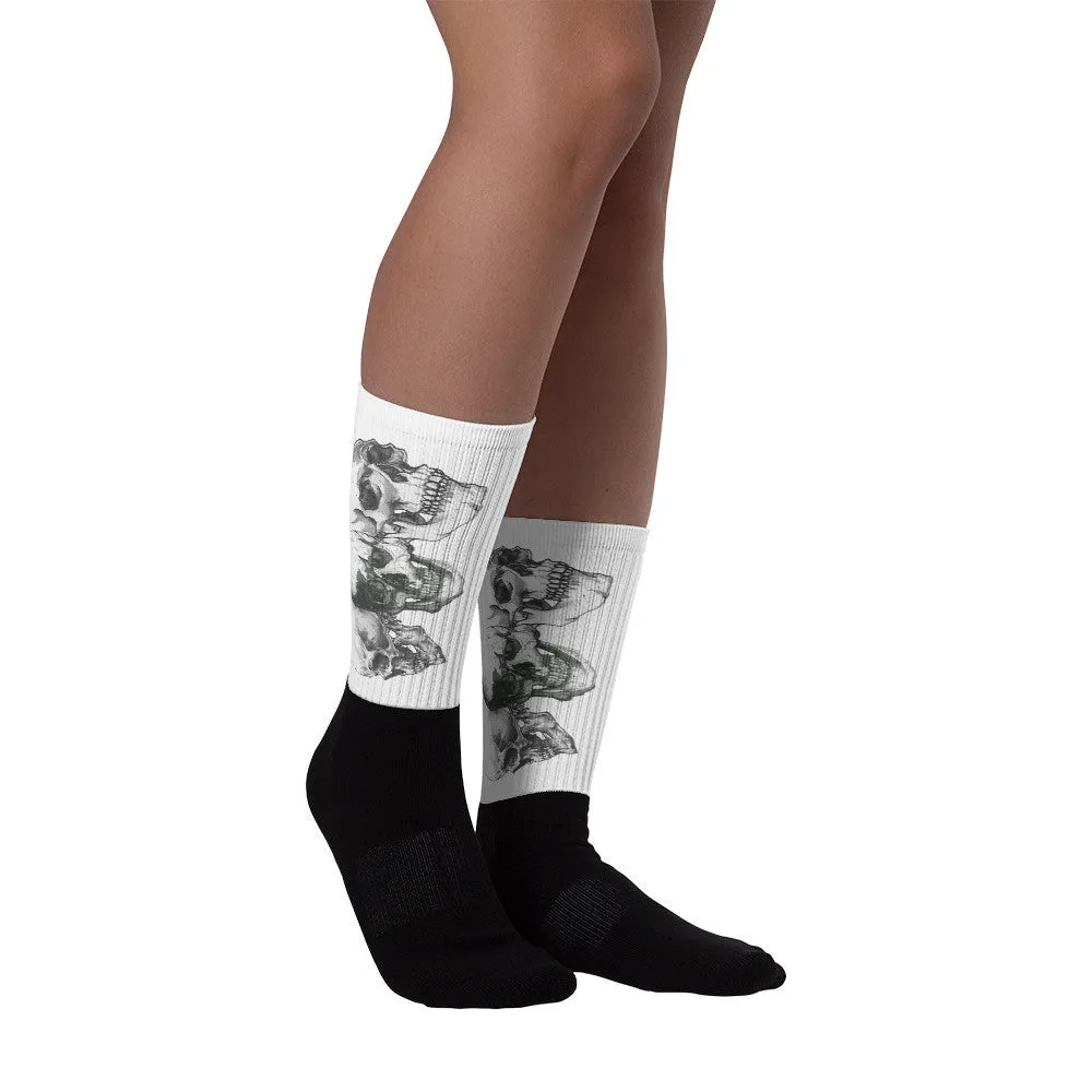 Triple Skulls Black foot socks illustrated by Robert Bowen
